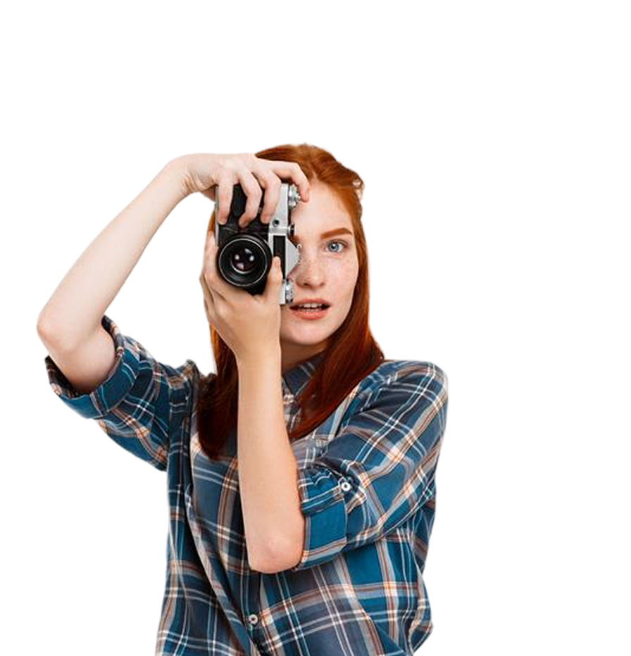 Fotógrafa haciendo una foto con cámara réflex